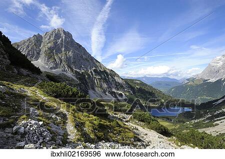 "View of Mt Sonnenspitze above Seebensee Lake, Mt Zugspitze, right, Ehrwald, Tyrol, Austria, Europe, PublicGround, Europe" View Large Photo Image Stock Photograph - "View of Mt Sonnenspitze above Seebensee Lake, Mt Zugspitze, right, Ehrwald, Tyrol, Austria, Europe, PublicGround, Europe". Fotosearch