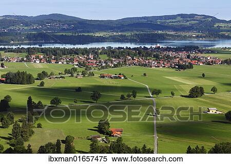 "View of Schwangau and Waltenhofen with Lake Forggensee, Ostallgaeu, Allgaeu, Schwaben, Bavaria, Germany, Europe" View Large Photo Image Stock Photography - "View of Schwangau and Waltenhofen with Lake Forggensee, Ostallgaeu, Allgaeu, Schwaben, Bavaria, Germany, Europe". Fotosearch