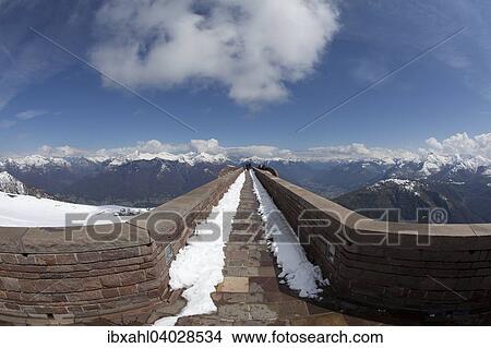 Picture - "View of swiss mountains from the Capella Santa Maria degli Angeli, Monte Tamaro, Rivera, Valle di Lugano, Canton of Ticino, Switzerland, Europe". Fotosearch