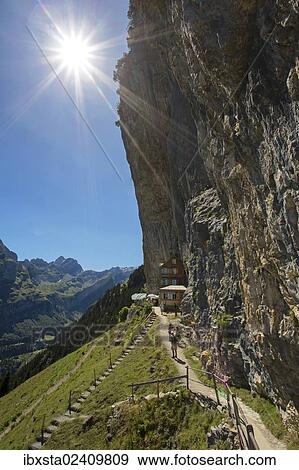 Stock Photo - "View of the Aescher mountain inn and Altmann mountain, with the sun, Alpstein mountain group, Ebenalp, Switzerland, Europe". Fotosearch