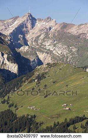 Stock Photo - "View of the Alpstein mountain group with Saentis mountain and Alpsiegel mountain as seen from Hoher Kasten mountain, Alpstein, Switzerland, Europe". Fotosearch