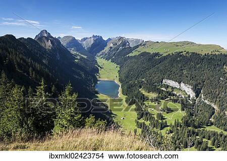 "View of the Appenzell Alps and lake Saemtisersee as seen from the geological mountain trail, Alpsigel on the right, canton of Appenzell Inner-Rhodes, Switzerland, Europe" View Large Photo Image Picture - "View of the Appenzell Alps and lake Saemtisersee as seen from the geological mountain trail, Alpsigel on the right, canton of Appenzell Inner-Rhodes, Switzerland, Europe". Fotosearch