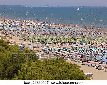 Stock Photo - "View of the beach with parasols and sun loungers, Lignano Sabbiadoro, Udine, Adriatic Coast, Italy, Europe". Fotosearch