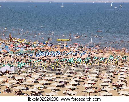 Stock Photo - "View of the beach with parasols and sun loungers, Lignano Sabbiadoro, Udine, Adriatic Coast, Italy, Europe". Fotosearch