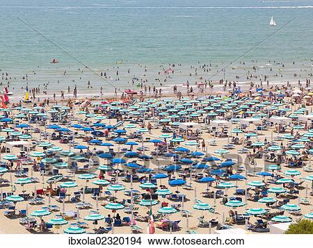 "View of the beach with parasols, sun loungers and bathers, Lignano Sabbiadoro, Udine, Adriatic Coast, Italy, Europe" View Large Photo Image Picture - "View of the beach with parasols, sun loungers and bathers, Lignano Sabbiadoro, Udine, Adriatic Coast, Italy, Europe". Fotosearch