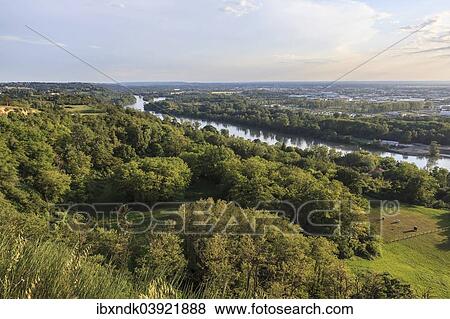 Stock Photo - "View of the Garonne River from the Pech-David hill in the evening light, Toulouse, France, Europe". Fotosearch