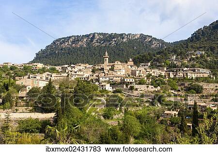 "View of the old town of Valldemossa and the parish church of Sant Bartomeu, Serra de Tramuntana, Northwestern Coast, Mallorca, Majorca, Balearic Islands, Spain, Europe" View Large Photo Image Stock Image - "View of the old town of Valldemossa and the parish church of Sant Bartomeu, Serra de Tramuntana, Northwestern Coast, Mallorca, Majorca, Balearic Islands, Spain, Europe". Fotosearch