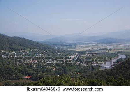 Stock Photograph - "View of the small town of Thaton with the Kok River or Mae Nam Kok River, Thaton, Chiang Rai Province, Thailand, Asia". Fotosearch