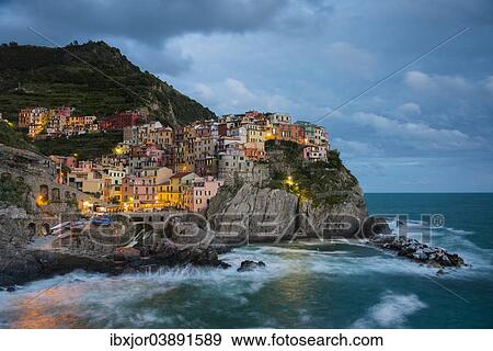 "View of the town at dusk, Manarola, Cinque Terre, Liguria, Italy, Europe" View Large Photo Image Stock Photo - "View of the town at dusk, Manarola, Cinque Terre, Liguria, Italy, Europe". Fotosearch