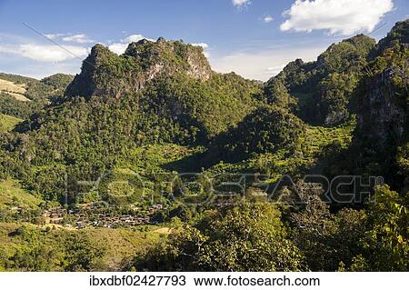 Stock Image - "View of the village and mountains, jungle, bamboo forest, Soppong or Pang Mapha area, Mae Hong Son province, northern Thailand, Thailand, Asia". Fotosearch