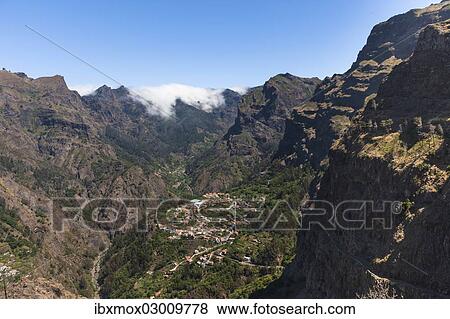 "View of the village of Curral das Freiras seen from Pico dos Barcelos mountain, with its deep gorges, Curral das Freiras, Funchal, Madeira, Portugal, Europe" View Large Photo Image Stock Photo - "View of the village of Curral das Freiras seen from Pico dos Barcelos mountain, with its deep gorges, Curral das Freiras, Funchal, Madeira, Portugal, Europe". Fotosearch