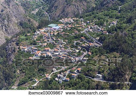 "View of the village of Curral das Freiras seen from Pico dos Barcelos mountain, with its deep gorges, Curral das Freiras, Funchal, Madeira, Portugal, Europe" View Large Photo Image Stock Photo - "View of the village of Curral das Freiras seen from Pico dos Barcelos mountain, with its deep gorges, Curral das Freiras, Funchal, Madeira, Portugal, Europe". Fotosearch