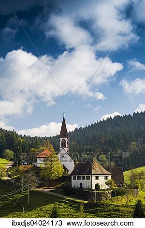 Stock Image - "View of the village with church, St. Roman, near Wolfach, Ortenau, Black Forest, Baden-Wurttemberg, Germany, Europe". Fotosearch