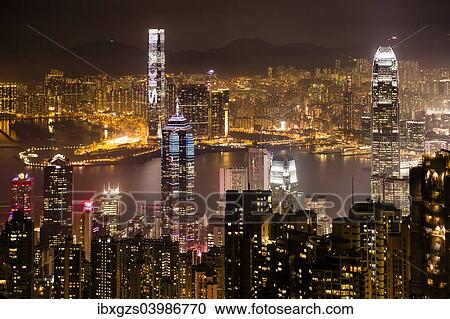 Stock Image - "View over Hong Kong skyline from Victoria Peak at night, Central District, Hong Kong, China, Asia". Fotosearch