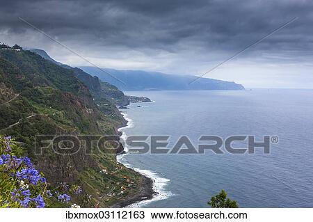 Stock Image - "View over the cliffs near Arco de Sao Jorge, Terras de Forca, Sao Jorge, Madeira, Portugal, Europe". Fotosearch