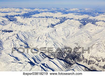 Stock Photo - "View over the Eastern Alps from a plane, Tyrol". Fotosearch