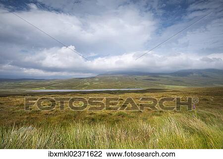 "View over the moor with Loch Coulside and Ben Loyal in the clouds, Sutherland, Scotland, Great Britain, Europe" View Large Photo Image Stock Image - "View over the moor with Loch Coulside and Ben Loyal in the clouds, Sutherland, Scotland, Great Britain, Europe". Fotosearch