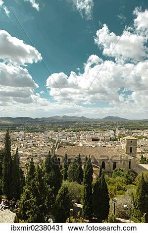 "View over the roofs of the old town of Arta, Majorca, Mallorca, Balearic Islands, Spain, Europe" View Large Photo Image Stock Image - "View over the roofs of the old town of Arta, Majorca, Mallorca, Balearic Islands, Spain, Europe". Fotosearch