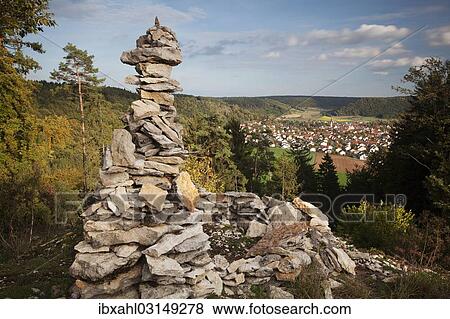 "View past a cairn towards Dietfurt from Hirschblick lookout, Dietfurt, Bavaria, Germany, Europe" View Large Photo Image Stock Photo - "View past a cairn towards Dietfurt from Hirschblick lookout, Dietfurt, Bavaria, Germany, Europe". Fotosearch