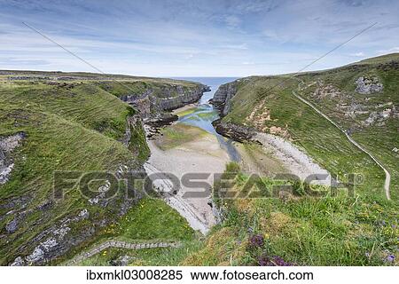 "View seen from the viewpoint above Smoo Cave in the nearly 800m long Geodha Smoo fjord, Durness, Northern Highlands, Scotland, United Kingdom, Europe" View Large Photo Image Stock Photography - "View seen from the viewpoint above Smoo Cave in the nearly 800m long Geodha Smoo fjord, Durness, Northern Highlands, Scotland, United Kingdom, Europe". Fotosearch