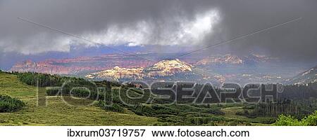 "View through the clouds from the green forested Boulder Mountain towards Capitol Reef, Boulder Town, Utah, United States, North America" View Large Photo Image Stock Photo - "View through the clouds from the green forested Boulder Mountain towards Capitol Reef, Boulder Town, Utah, United States, North America". Fotosearch