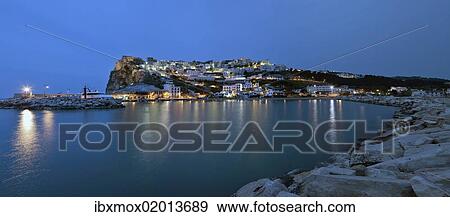 "View towards Peschici at night, province of Foggia, Apulia, Puglia, Gargano, Adria, Italy, Europe" View Large Photo Image Stock Photo - "View towards Peschici at night, province of Foggia, Apulia, Puglia, Gargano, Adria, Italy, Europe". Fotosearch