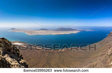 "Views of La Graciosa island from the Mirador del Rio, Lanzarote, Canary Islands, Spain, Europe" View Large Photo Image Stock Image - "Views of La Graciosa island from the Mirador del Rio, Lanzarote, Canary Islands, Spain, Europe". Fotosearch