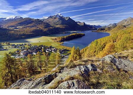 "Views of Lake Sils and Piz da la Margna in autumnal Upper Engadine Sils-Baselgia, Engadin, Grisons, Switzerland, Europe" View Large Photo Image Stock Image - "Views of Lake Sils and Piz da la Margna in autumnal Upper Engadine Sils-Baselgia, Engadin, Grisons, Switzerland, Europe". Fotosearch