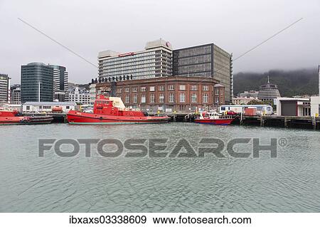 Stock Photo - "Views of the harbour and on the Parliament of New Zealand, """"The Beehive"""", Pipitea, Wellington, Wellington Region, New Zealand, Oceania". Fotosearch
