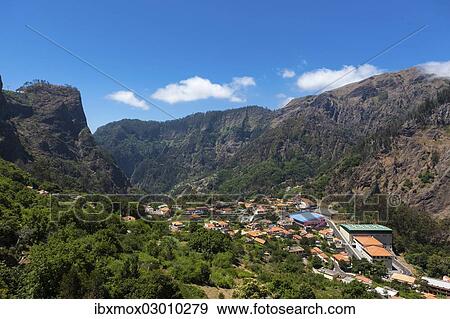 Stock Photo - "Village of Curral das Freiras in the mountains of Pico dos Barcelos, with its deep ravines, Funchal Pico dos Barcelos, Curral das Freiras, Ilha da Madeira, Portugal, Europe". Fotosearch