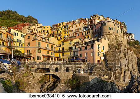 Stock Photograph - "Village with colourful houses, Manarola, Cinque Terre, UNESCO World Heritage Site, Province of La Spezia, Liguria, Italy, Europe". Fotosearch
