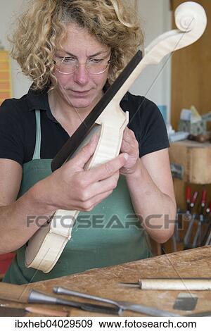 "Violin making, attaching the neck" View Large Photo Image Stock Photo - "Violin making, attaching the neck". Fotosearch