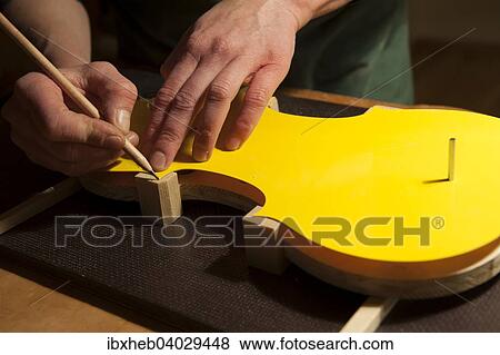 "Violin making, marking the blocks" View Large Photo Image Stock Photo - "Violin making, marking the blocks". Fotosearch