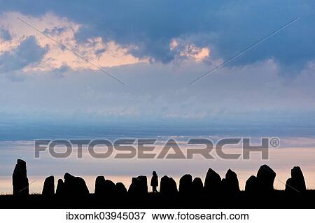 "Visitors at the Ale's Stones, largest preserved stone ship in Scandinavia, sunset, Kaseberga, Scania, Sweden, Europe" View Large Photo Image Stock Photo - "Visitors at the Ale's Stones, largest preserved stone ship in Scandinavia, sunset, Kaseberga, Scania, Sweden, Europe". Fotosearch