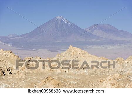 "Volcano Licancabur from Valle de la Luna or Valley of the Moon from San Pedro de Atacama, Antofagasta Region, Chile, South America" View Large Photo Image Stock Image - "Volcano Licancabur from Valle de la Luna or Valley of the Moon from San Pedro de Atacama, Antofagasta Region, Chile, South America". Fotosearch
