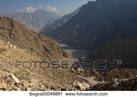 "Wadi in the wild mountain landscape, Musandam Governorate, Oman, Asia" View Large Photo Image Stock Image - "Wadi in the wild mountain landscape, Musandam Governorate, Oman, Asia". Fotosearch
