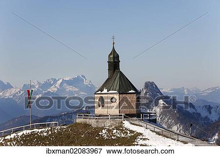 "Wallbergkirche, Heilig Kreuz church on Mt Wallberg, Mountains Zugspitze, Rossstein and Buchstein, Upper Bavaria, Bavaria, Germany, Europe, PublicGround, Europe" View Large Photo Image Stock Photo - "Wallbergkirche, Heilig Kreuz church on Mt Wallberg, Mountains Zugspitze, Rossstein and Buchstein, Upper Bavaria, Bavaria, Germany, Europe, PublicGround, Europe". Fotosearch