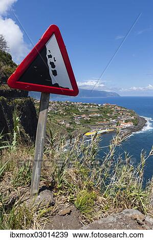 "Warning sign, falling rocks, at a road along the cliffs at Ponta Delgada, Vicente, Boaventura, Madeira, Portugal, Europe" View Large Photo Image Stock Photo - "Warning sign, falling rocks, at a road along the cliffs at Ponta Delgada, Vicente, Boaventura, Madeira, Portugal, Europe". Fotosearch