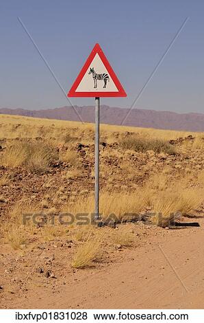 "Warning sign for zebras at the entrance of the Namib Rand Nature Reserve, Namib Desert, Namibia, Africa" View Large Photo Image Stock Photo - "Warning sign for zebras at the entrance of the Namib Rand Nature Reserve, Namib Desert, Namibia, Africa". Fotosearch