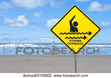 "Warning sign """"strong currents"""", on a beach, Muriwai Beach, West Coast, Auckland, Auckland Region, New Zealand, Oceania" View Large Photo Image Stock Image - "Warning sign """"strong currents"""", on a beach, Muriwai Beach, West Coast, Auckland, Auckland Region, New Zealand, Oceania". Fotosearch