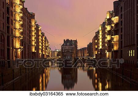 Stock Photography - "Wasserschloss, Water Castle in the old warehouse district of Speicherstadt, Hamburg, Hamburg, Germany, Europe". Fotosearch