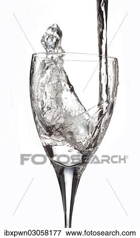 Water being poured into a glass View Large Photo Image Stock Photo - Water being poured into a glass. Fotosearch