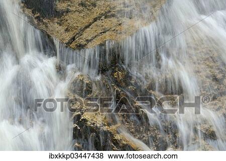 "Water cascade, water flowing over rocks in the stream bed of the Ilse River, Ilsenburg, Saxony-Anhalt, Germany, Europe" View Large Photo Image Stock Photo - "Water cascade, water flowing over rocks in the stream bed of the Ilse River, Ilsenburg, Saxony-Anhalt, Germany, Europe". Fotosearch