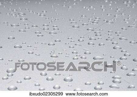 Water drops on a metal surface View Large Photo Image Stock Photo - Water drops on a metal surface. Fotosearch