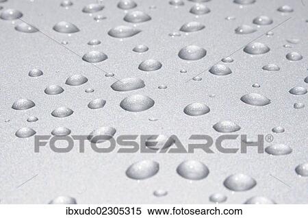 Water drops on a metal surface View Large Photo Image Stock Photography - Water drops on a metal surface. Fotosearch