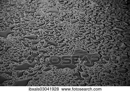 Water drops on a plastic surface View Large Photo Image Stock Photo - Water drops on a plastic surface. Fotosearch