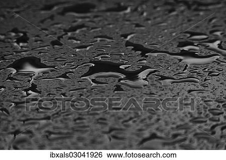 Water drops on a plastic surface View Large Photo Image Stock Photograph - Water drops on a plastic surface. Fotosearch