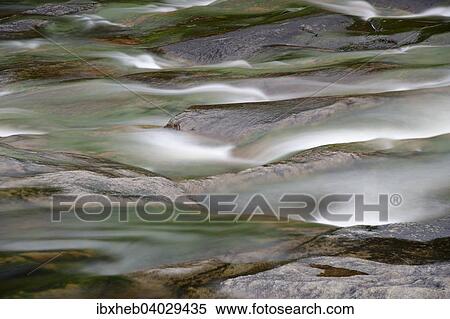 "Water flowing over rocks in rocky creek bed, Norway, Europe" View Large Photo Image Stock Photography - "Water flowing over rocks in rocky creek bed, Norway, Europe". Fotosearch