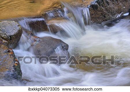 "Water running over rocks in a brook in autumn, Ilse mountain brook, Ilsenburg, Saxony-Anhalt, Germany, Europe" View Large Photo Image Stock Photography - "Water running over rocks in a brook in autumn, Ilse mountain brook, Ilsenburg, Saxony-Anhalt, Germany, Europe". Fotosearch