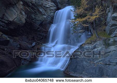 "Waterfall at dusk, Gran Paradiso National Park, Valle di Cogne, Piedmont, Italy, Europe" View Large Photo Image Stock Photo - "Waterfall at dusk, Gran Paradiso National Park, Valle di Cogne, Piedmont, Italy, Europe". Fotosearch